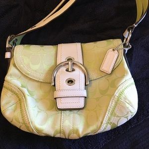 Light green and white Coach purse